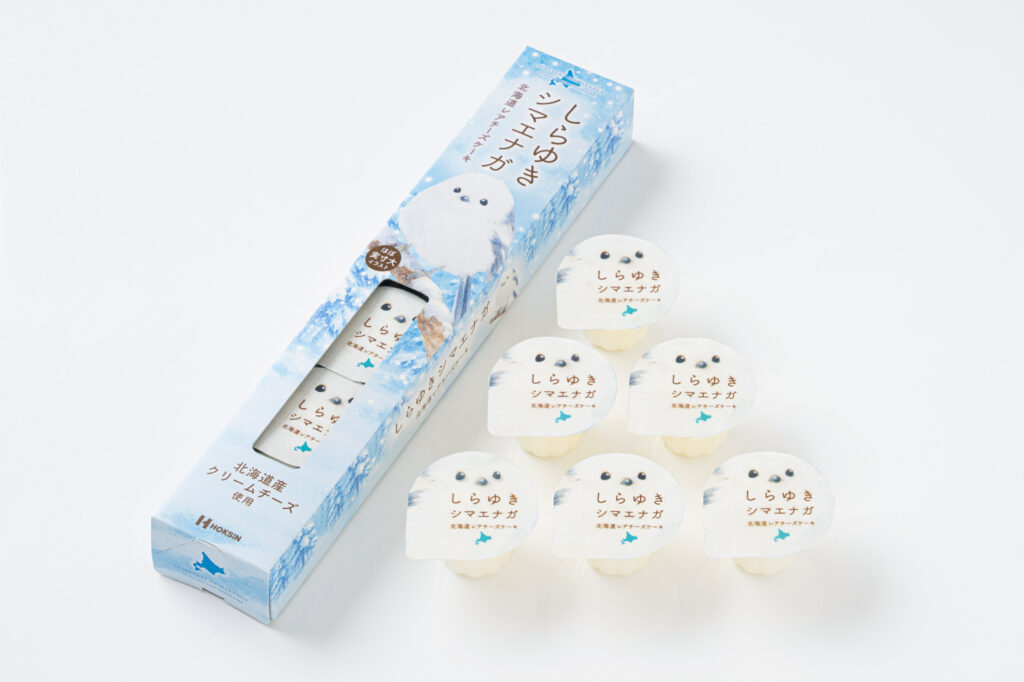 江別市の株式会社北辰フーズが発売する北海道限定土産 しらゆきシマエナガ 実寸大デザインのレアチーズケーキ